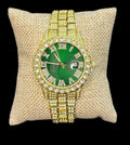 Reloj Dorado Zirconias Fondo Verde