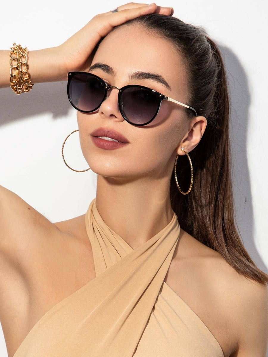 Gafas de sol con montura redonda elegantes
