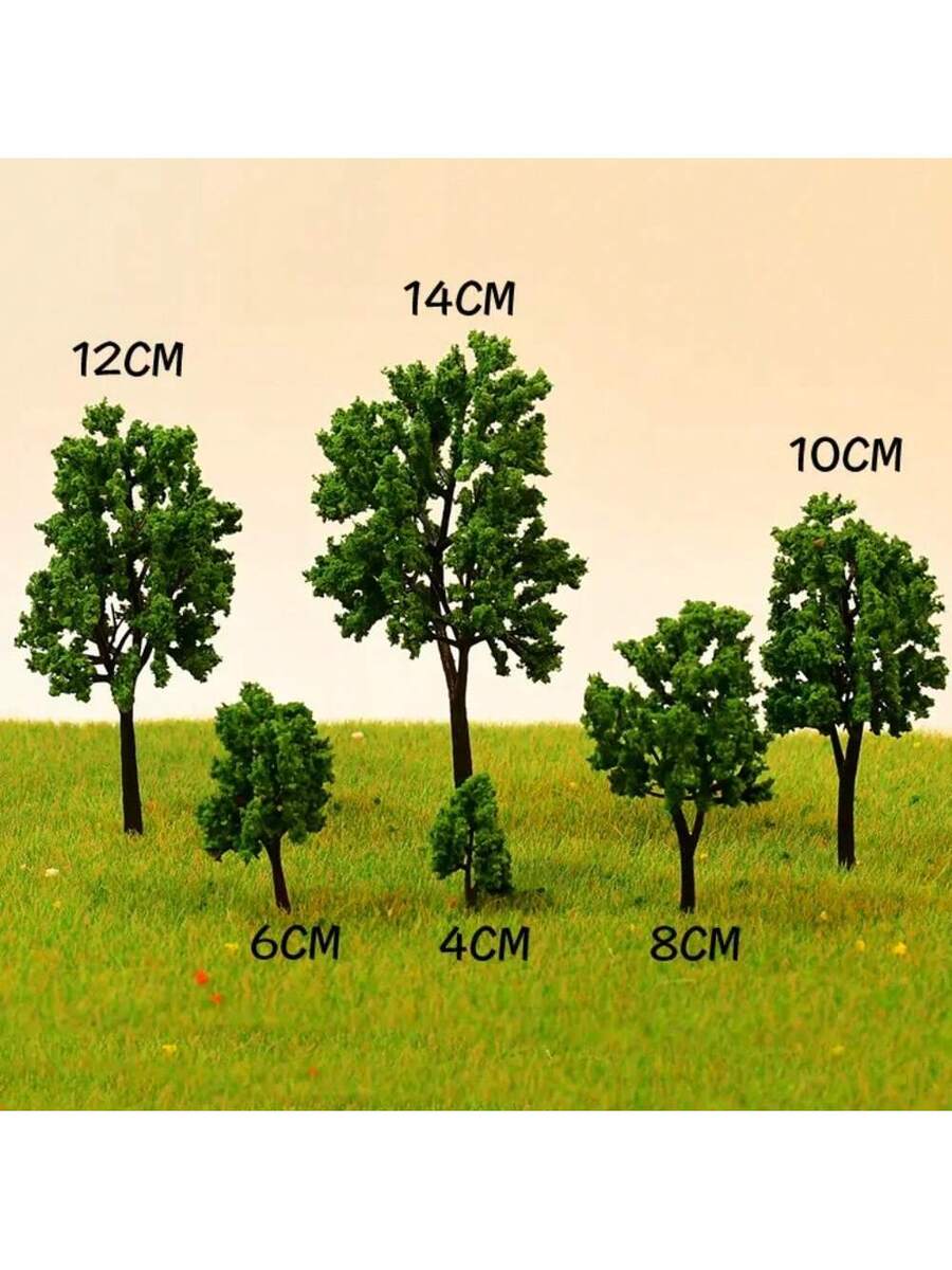 Árboles de plástico en escala