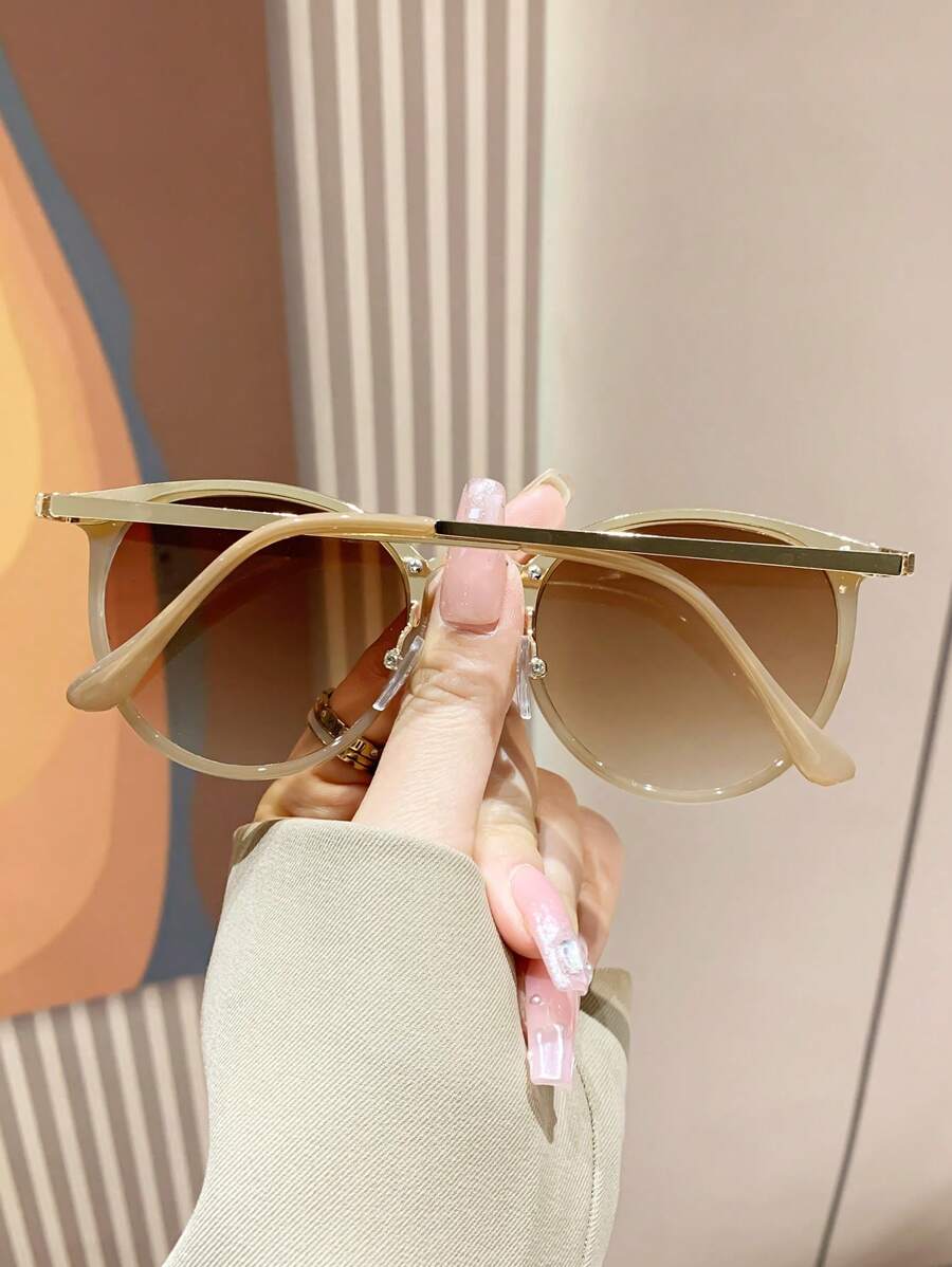 Gafas de sol con montura redonda elegantes