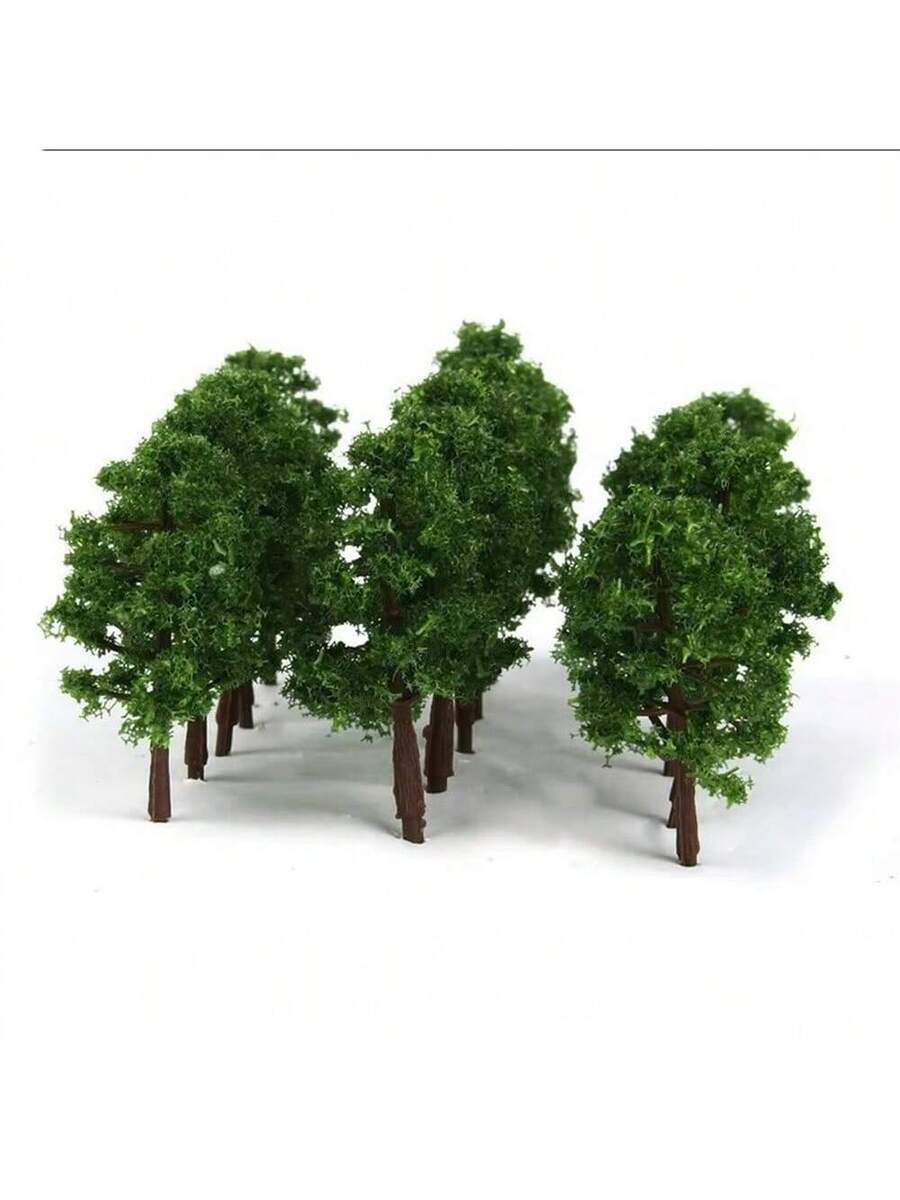 Árboles de plástico en escala