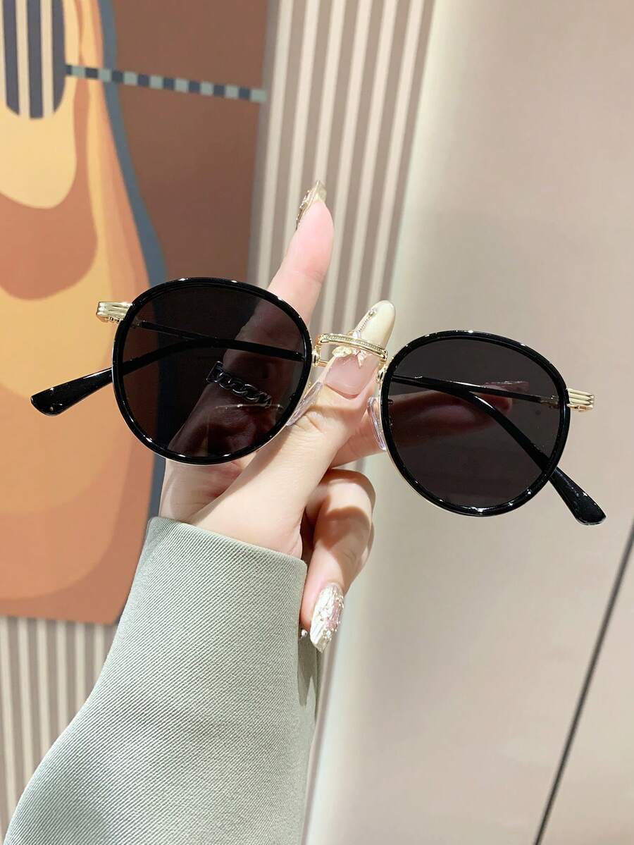 Gafas de sol con montura redonda elegantes