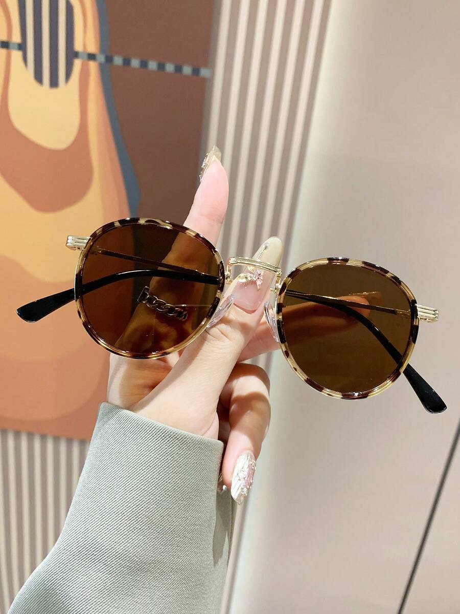 Gafas de sol con montura redonda elegantes