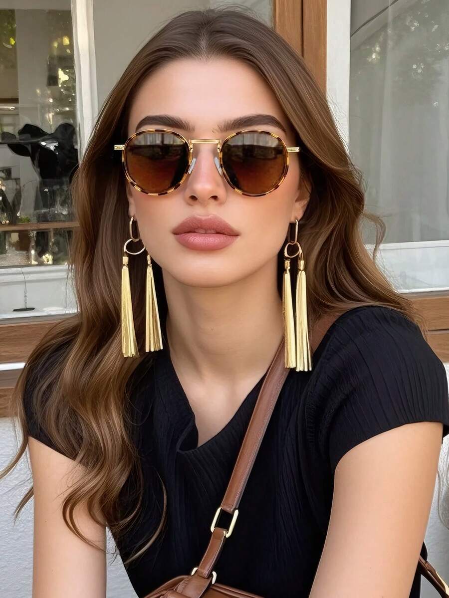 Gafas de sol con montura redonda elegantes