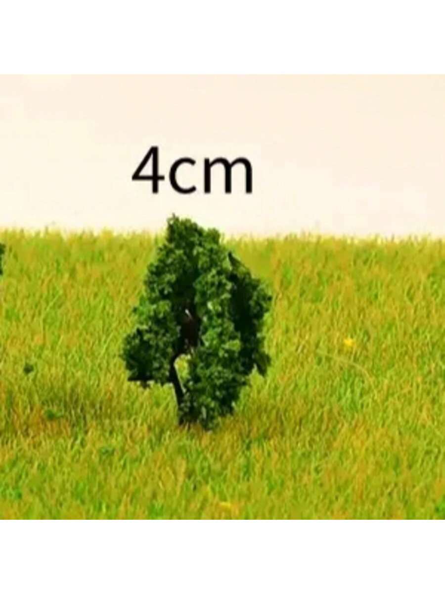 Árboles de plástico en escala
