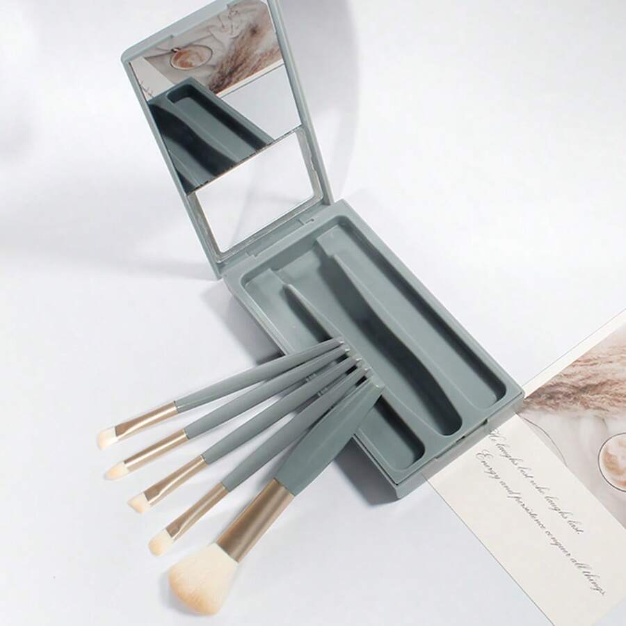 5 pinceles de maquillaje con espejo
