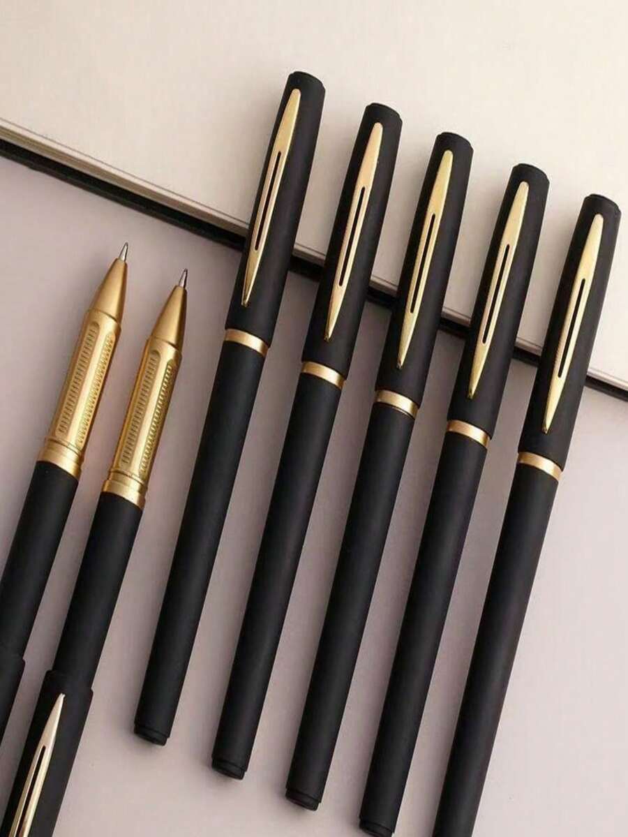 elegante juego de bolígrafos de gel negro y dorado