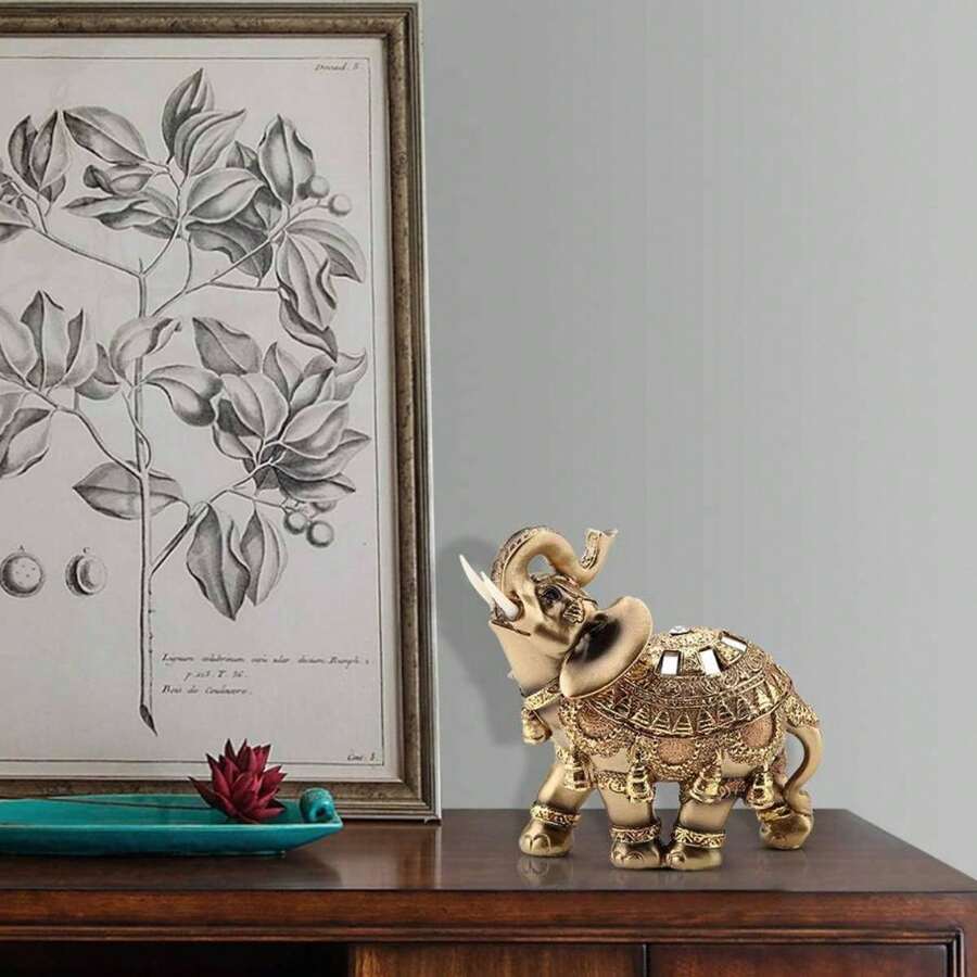 Estatua de elefante de poliresina dorada