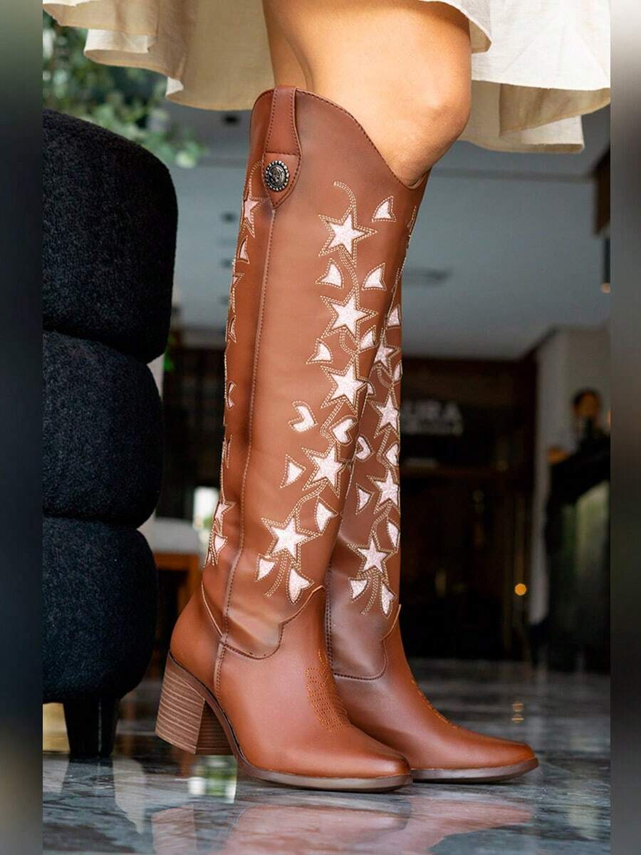 Botas vaqueras con laser y fondo de brillos