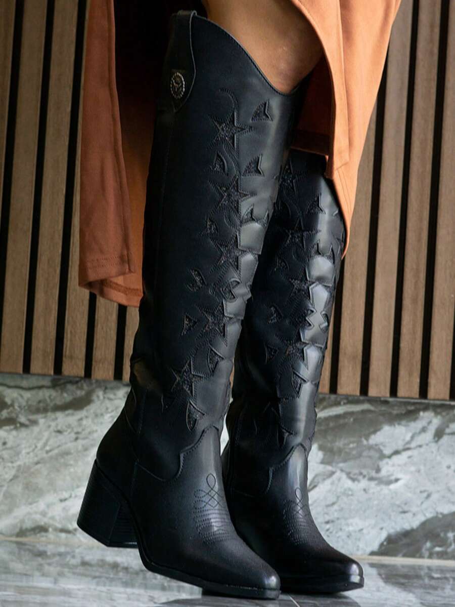 Botas vaqueras con laser y fondo de brillos