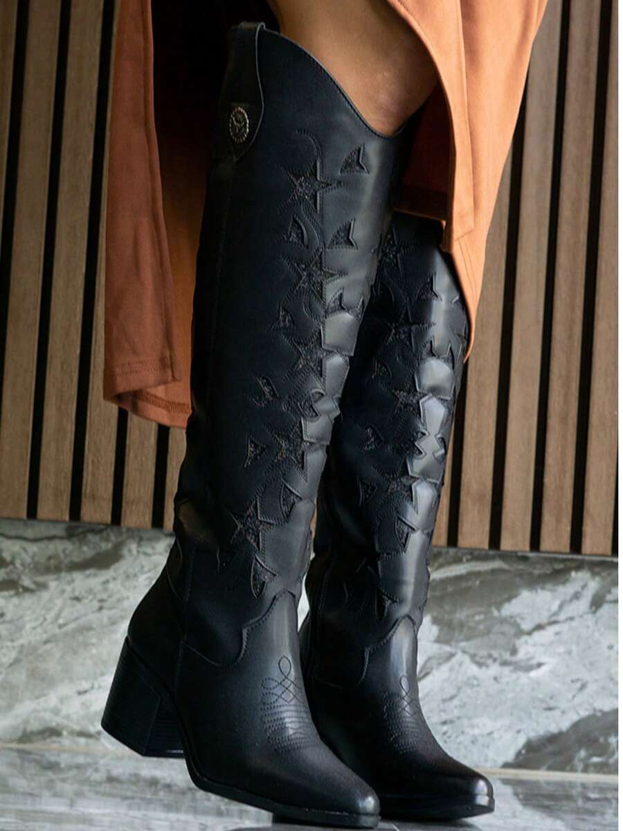 Botas vaqueras con laser y fondo de brillos