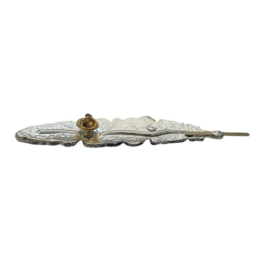 Pluma Metálica