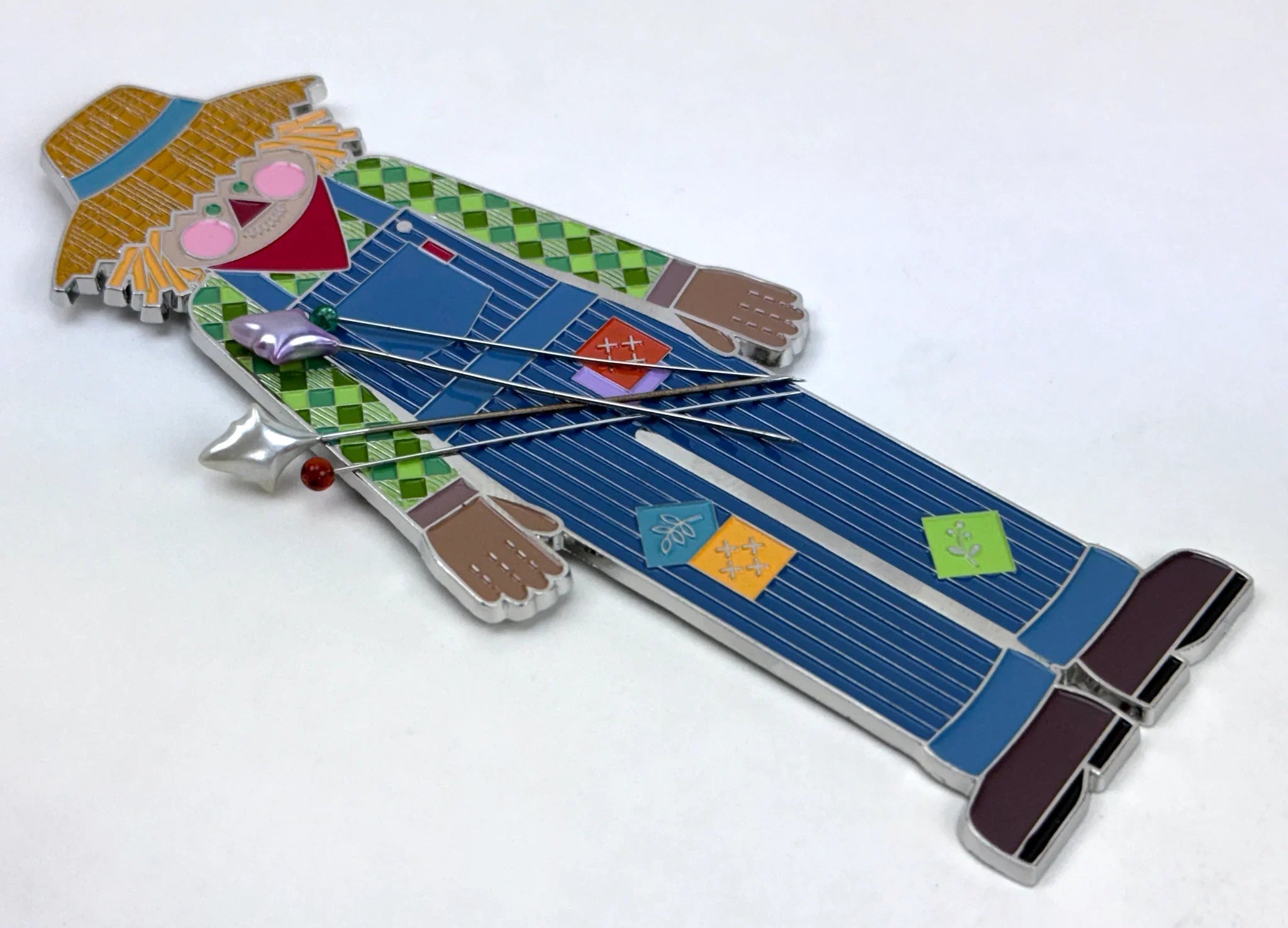 Guardagujas Espantapajaros de Lori Holt