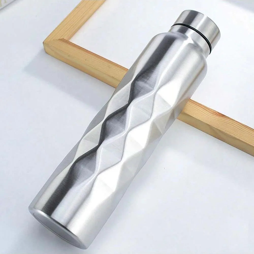 Botella de agua de acero inoxidable. 28x7cm