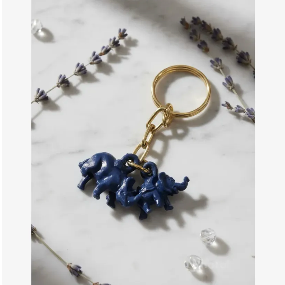 Llavero De Rinoceronte Y Elefante Azul Llavero