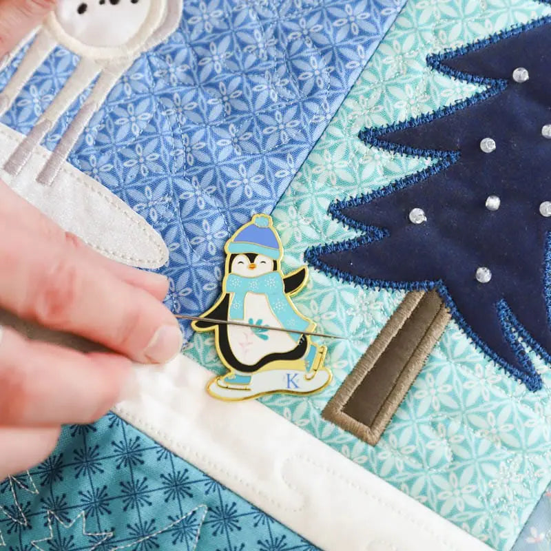 Invierno Encantado: Guardagujas de Pingüino