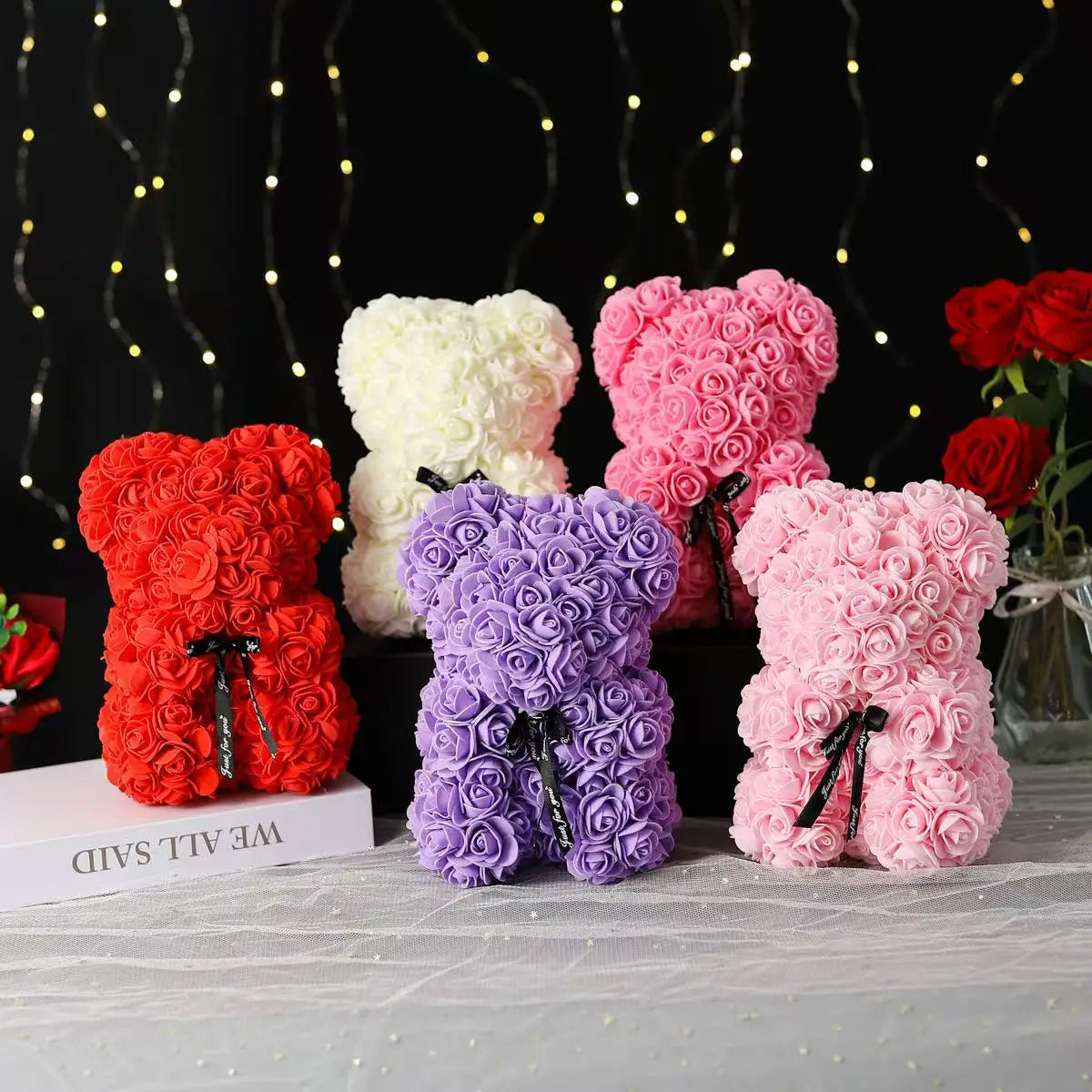 Oso de flor rosa de peluche