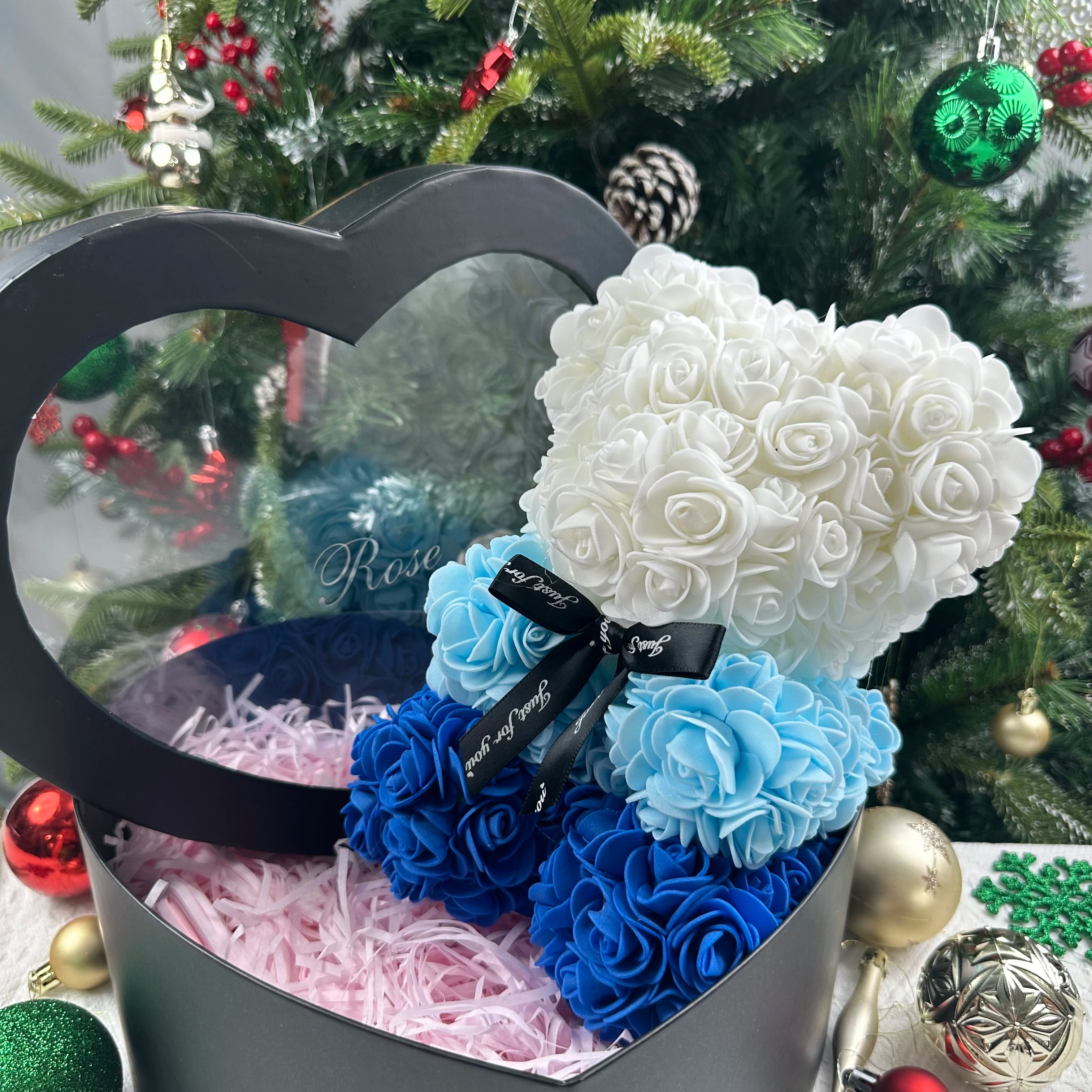 Oso de flor rosa de peluche