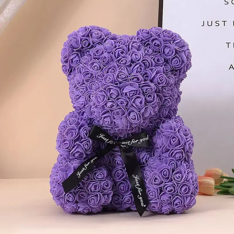 Oso de flor rosa de peluche