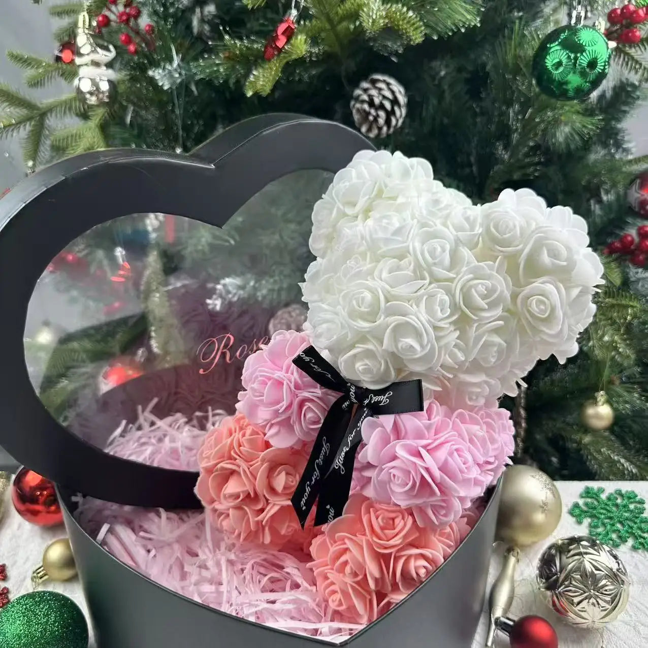 Oso de flor rosa de peluche
