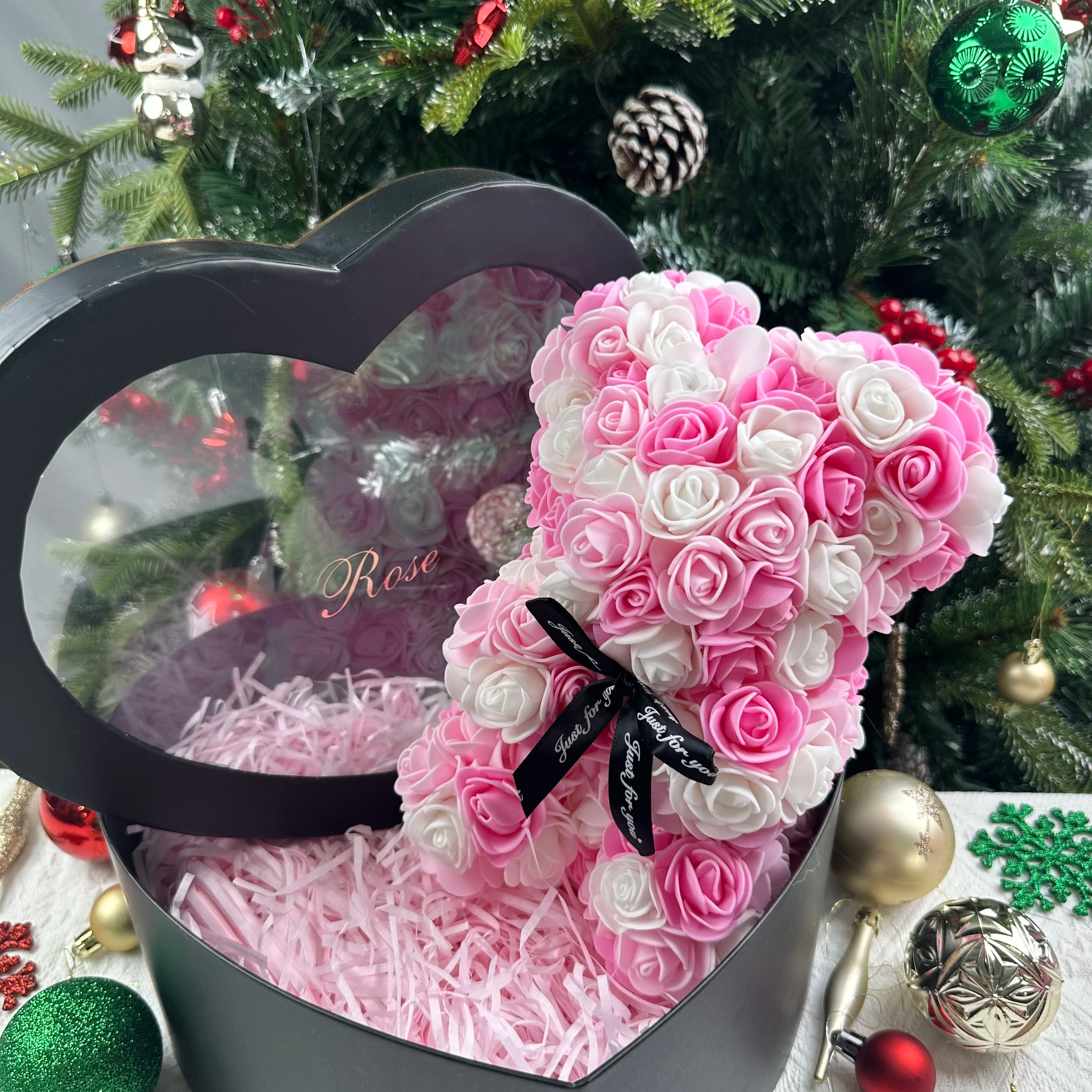 Oso de flor rosa de peluche