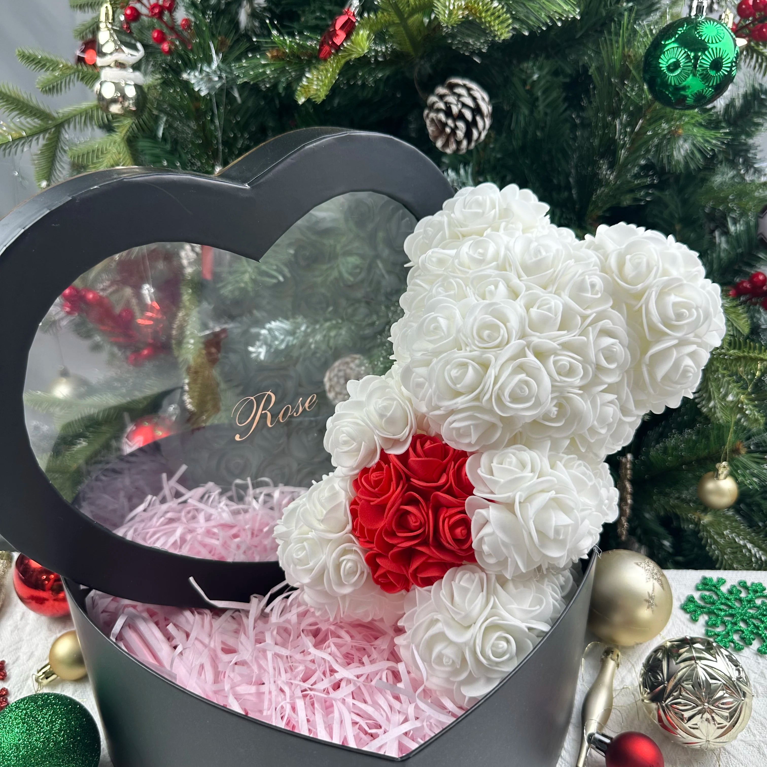 Oso de flor rosa de peluche