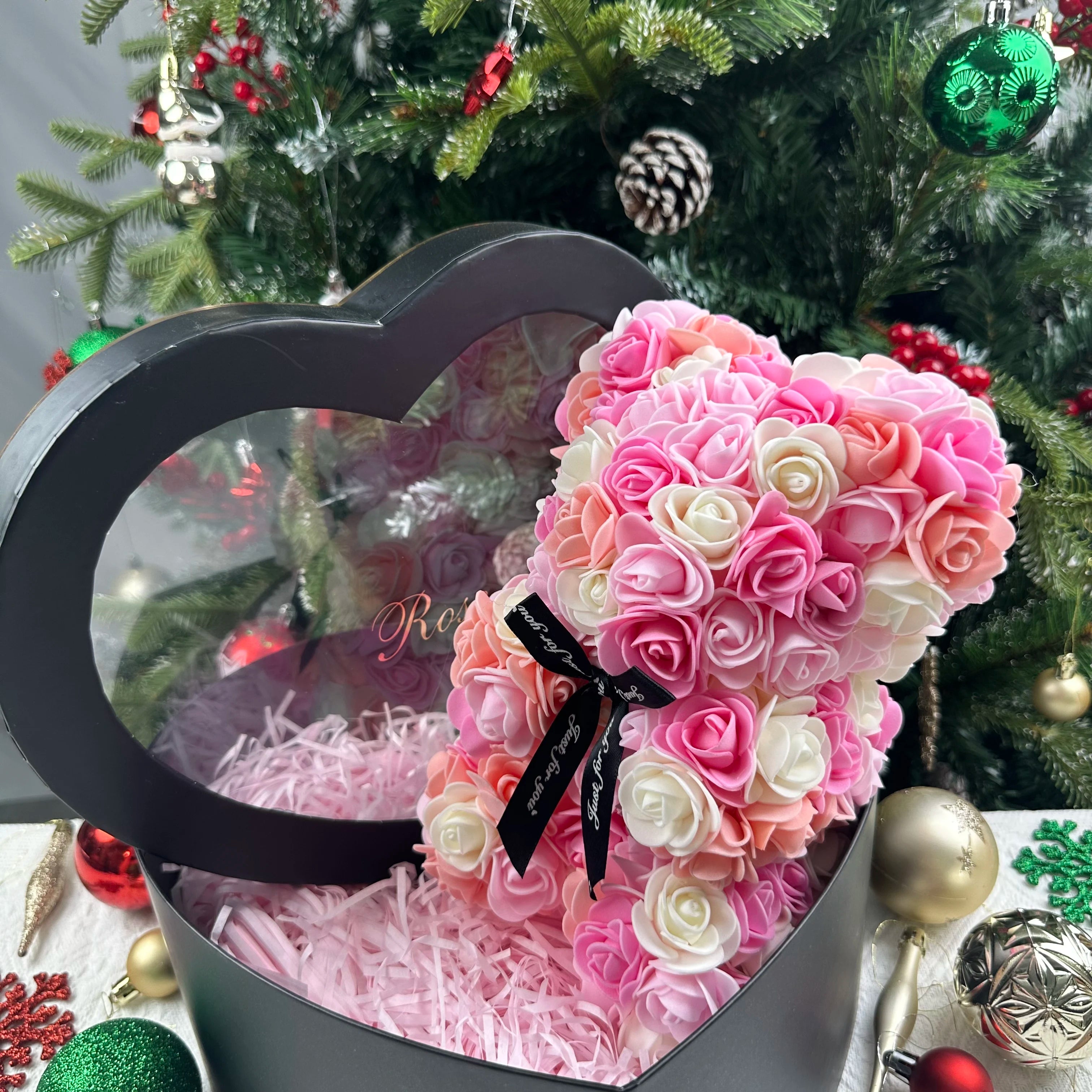 Oso de flor rosa de peluche