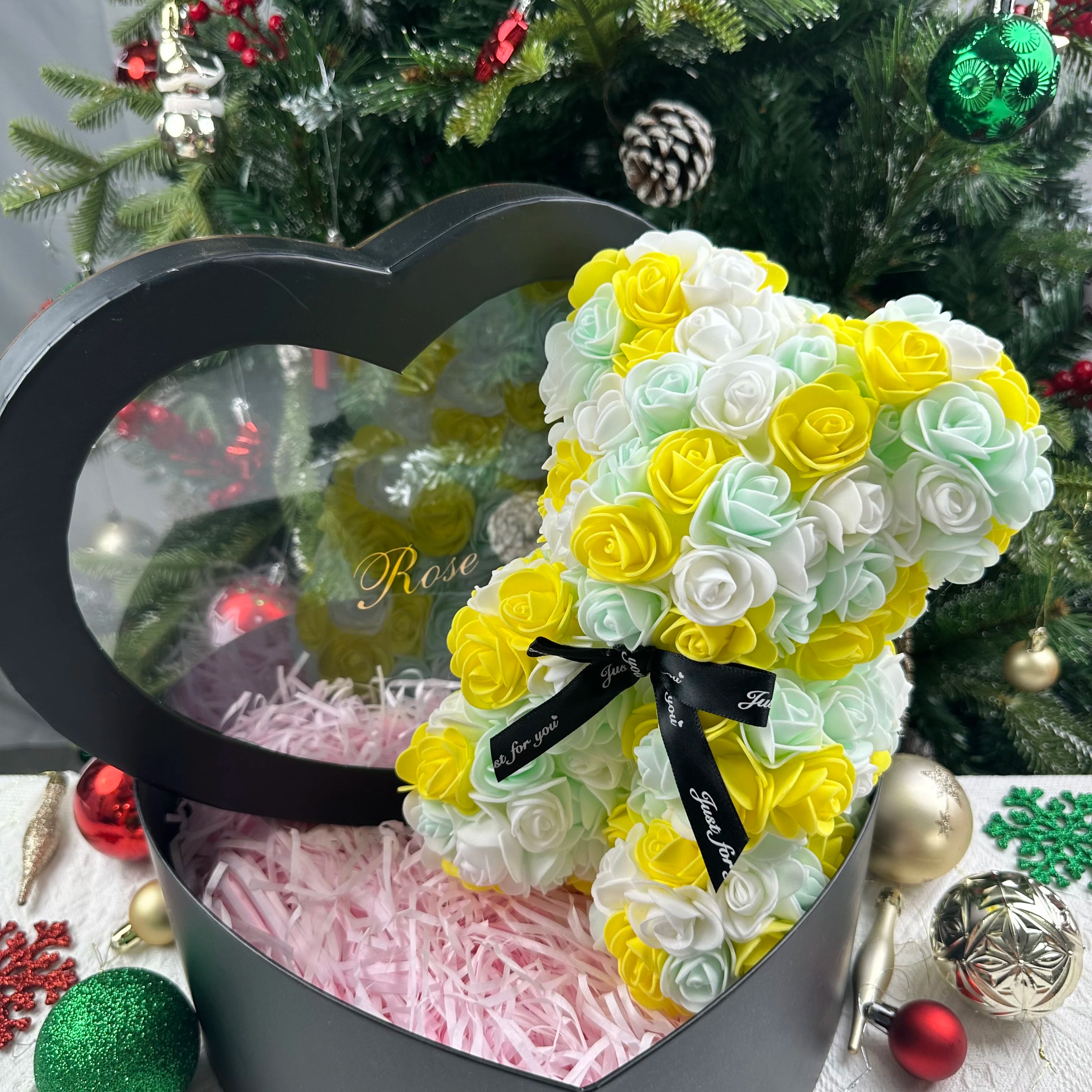 Oso de flor rosa de peluche