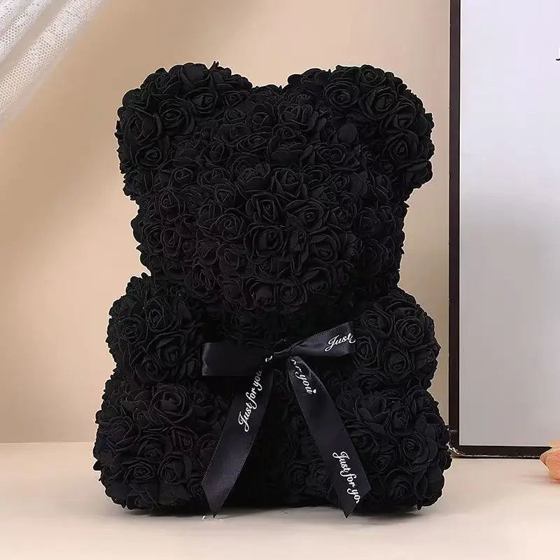Oso de flor rosa de peluche