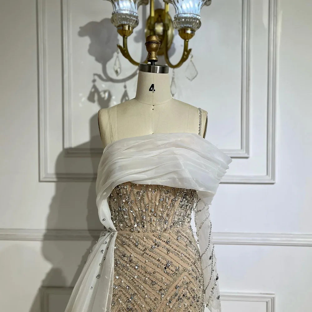 vestidos de noche de un hombro, sirena azul, perlas