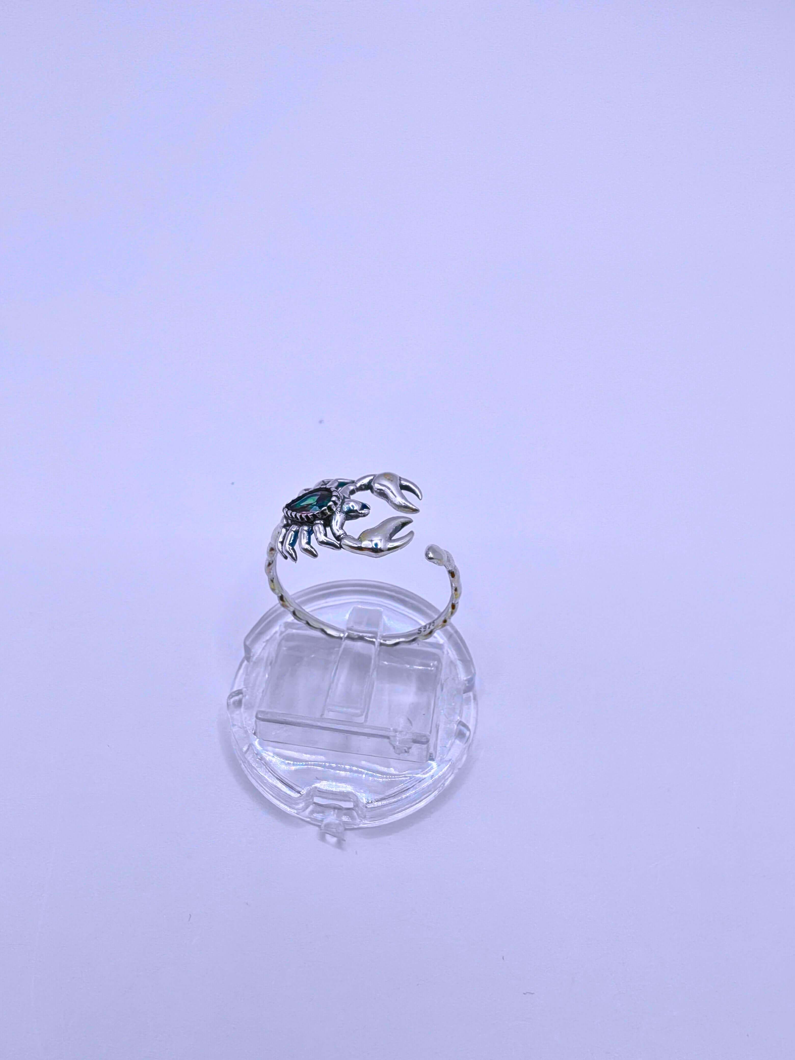 SR0044 - Anillo S925 Ley "Alacrán" Circonita Morada Calenbi