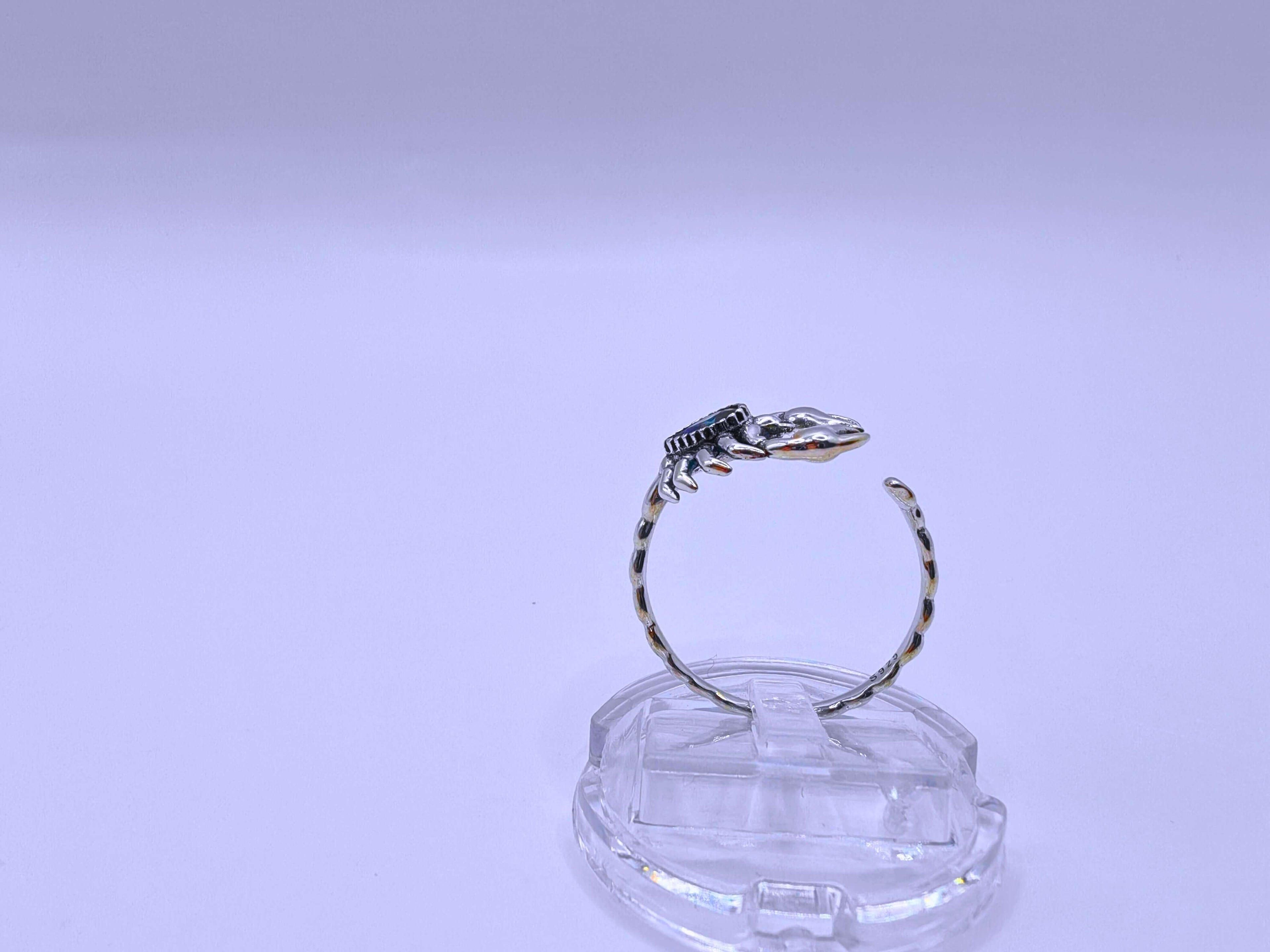 SR0044 - Anillo S925 Ley "Alacrán" Circonita Morada Calenbi