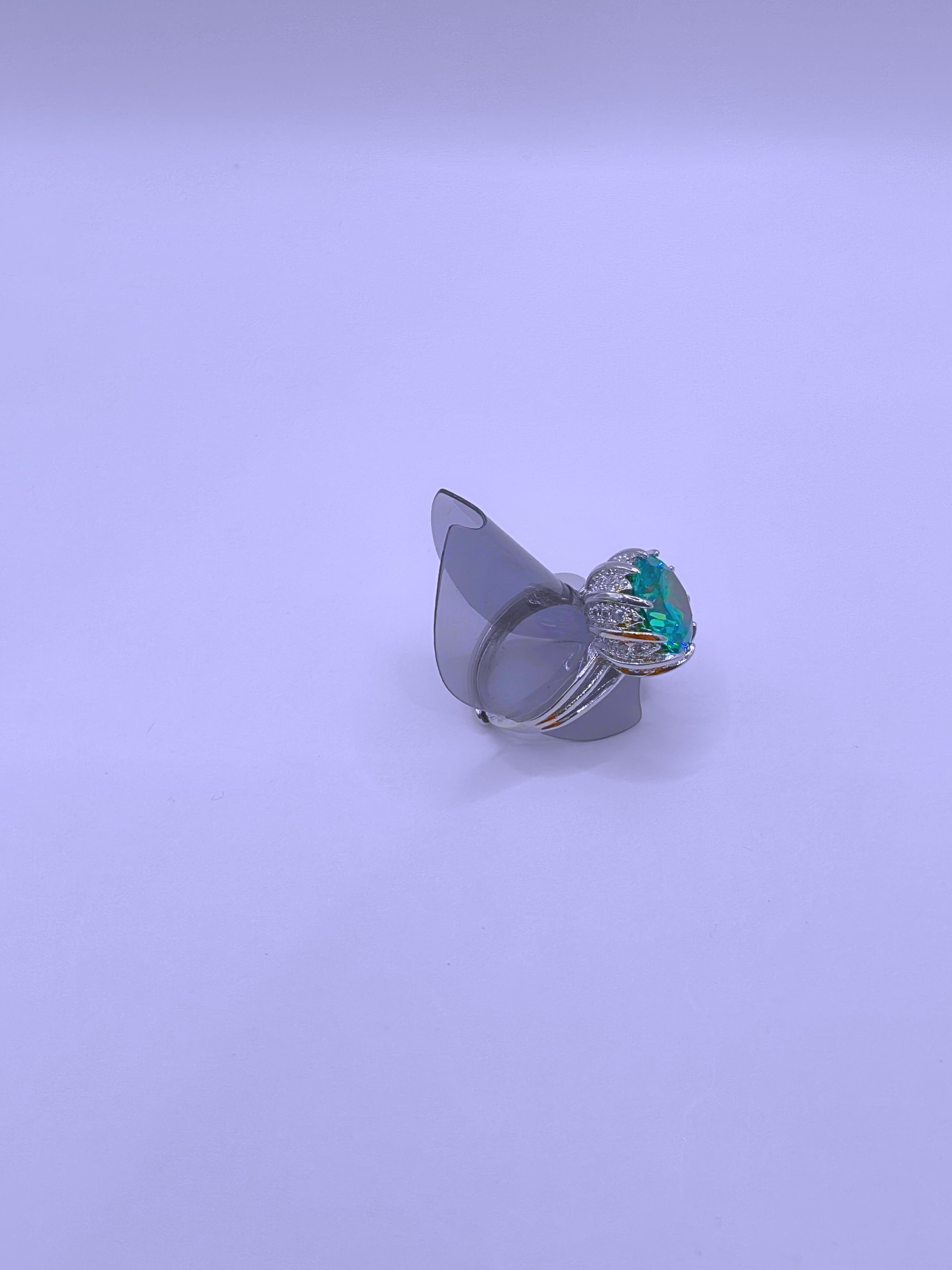 RB0017 - Anillo Aleación Circonita Cubica Turquesa Ajustable Calenbi